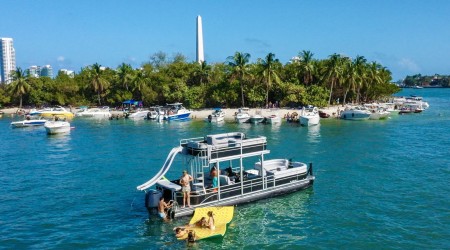 32 ft Premier double deck pontoon boat with water slide and top deck lounge